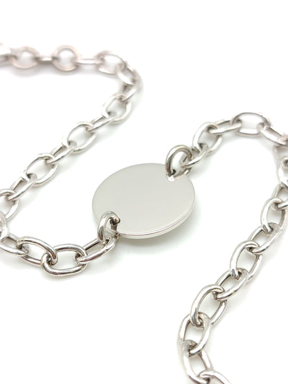 Silver bracelet with round button for engraving