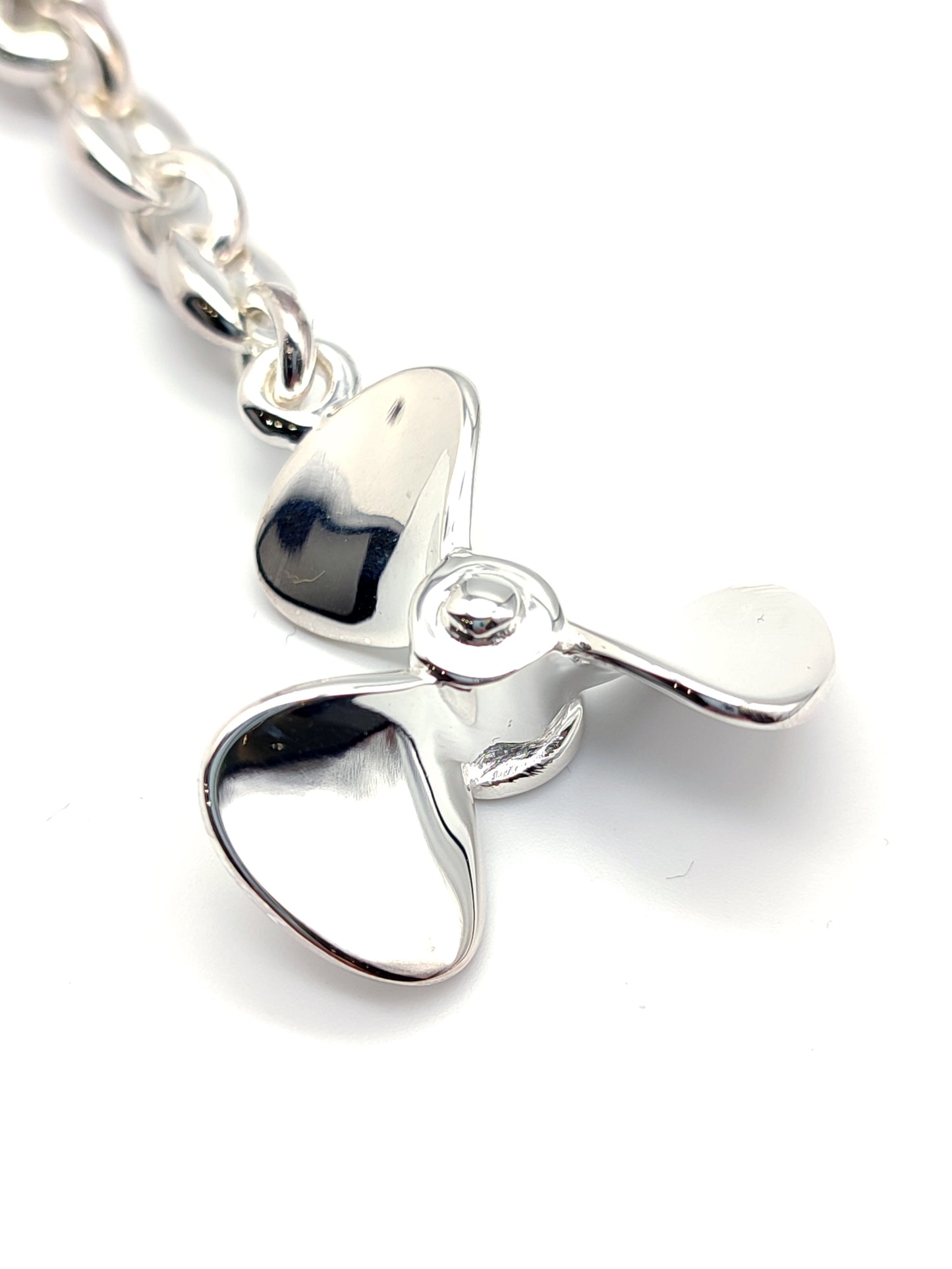 Solid silver key ring with propeller