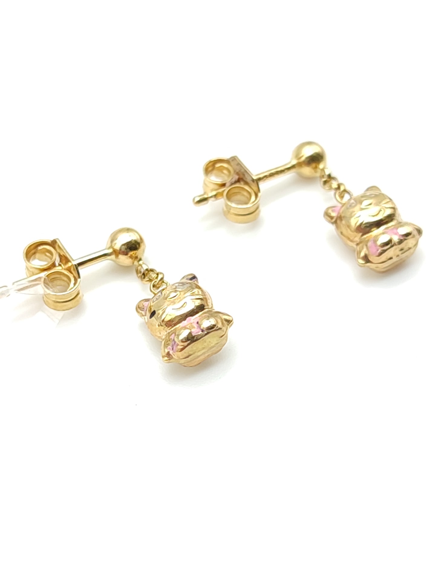Gold earrings with hanging kitten