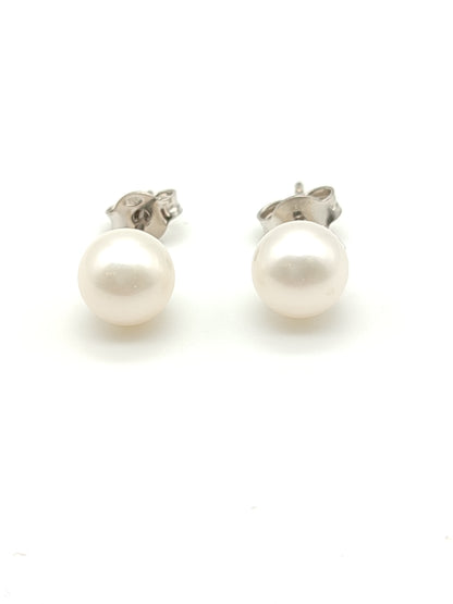 Gold earrings with lobe pearls