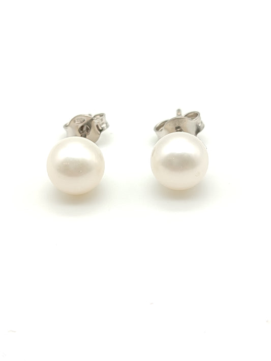 Gold earrings with lobe pearls
