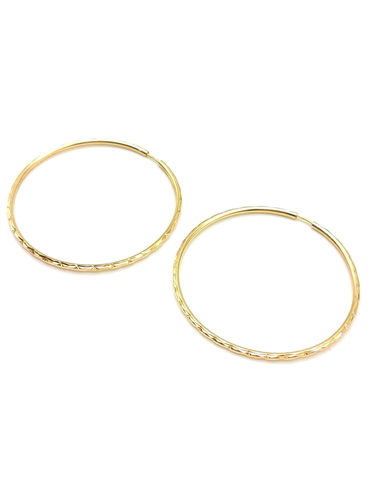 Orecchini in oro a cerchi grandi lavorati diametro 4,5 cm