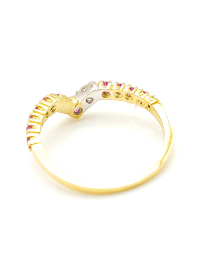 Gold ring with rubies and diamond