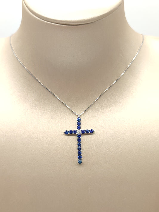 Cross necklace in white gold with blue sapphires and diamond