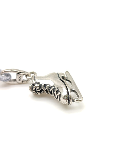 Silver ice skate key ring with satin cord