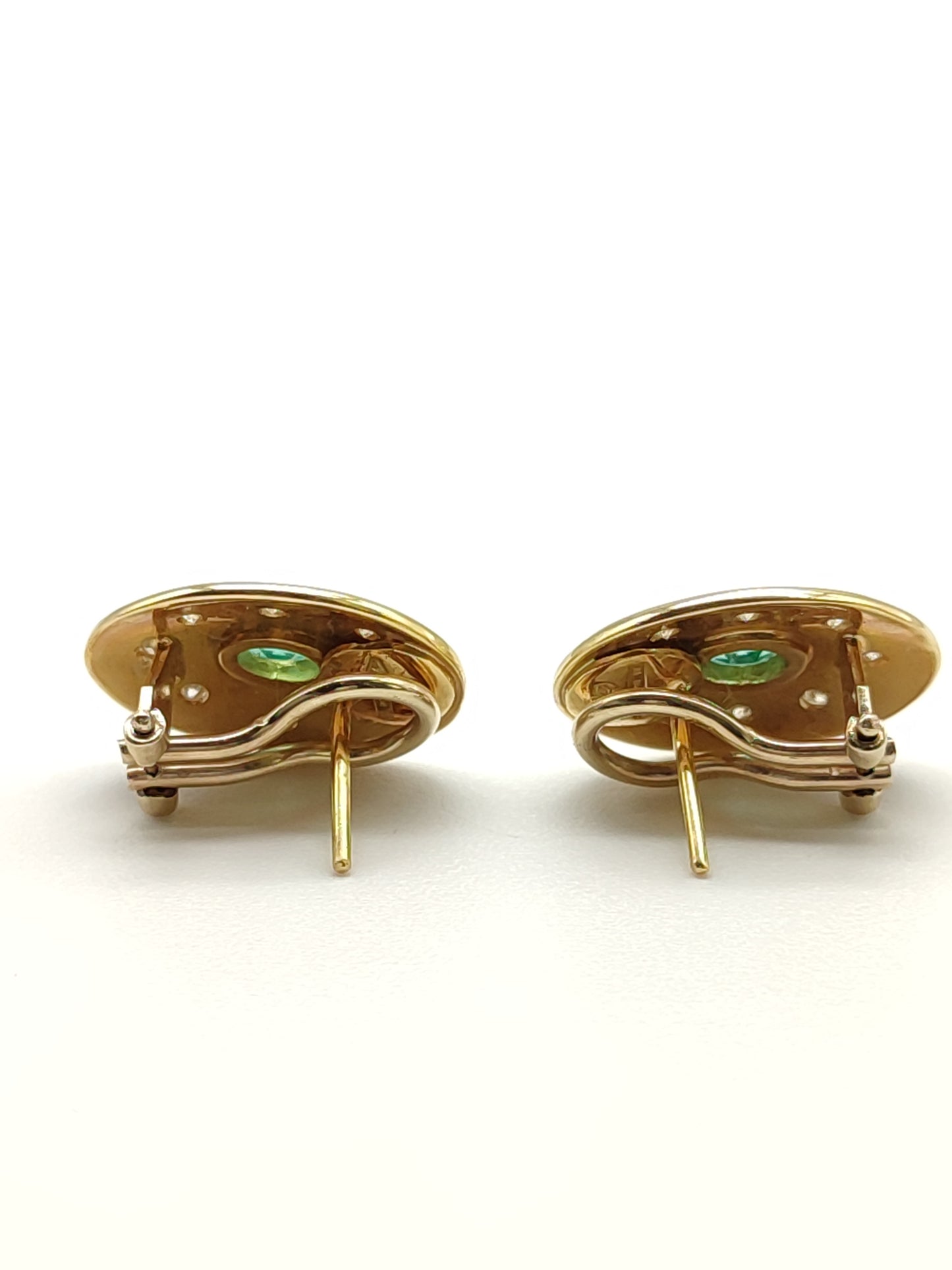 Gold earrings with diamonds and emeralds