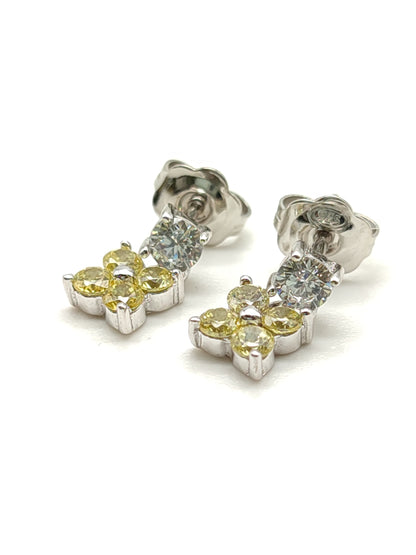 Silver lobe earrings with yellow zircons