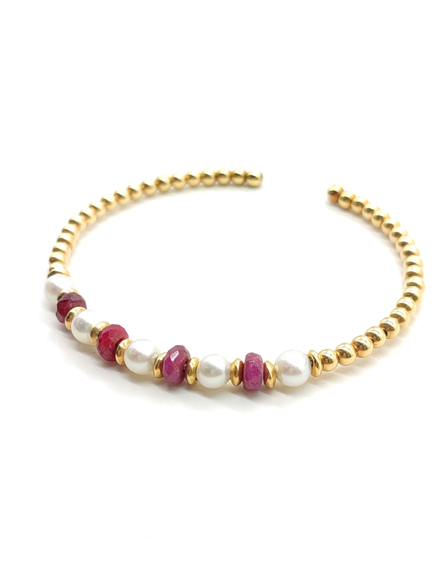 Gold bracelet with pearls and rubies