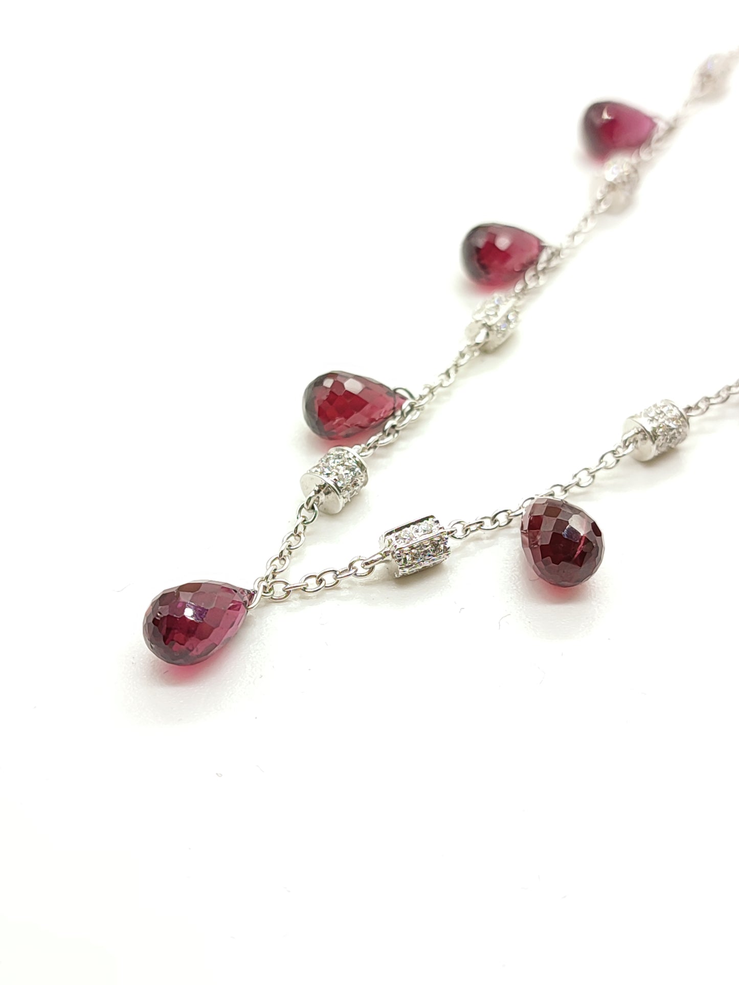 White gold necklace with diamonds and garnets