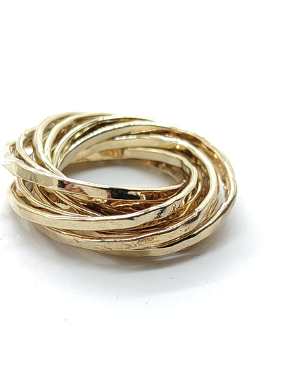 Multi strand ring in yellow gold hammered silver