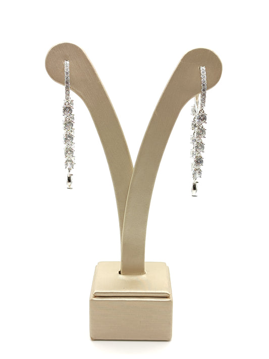 Snap earrings with dangling zircons