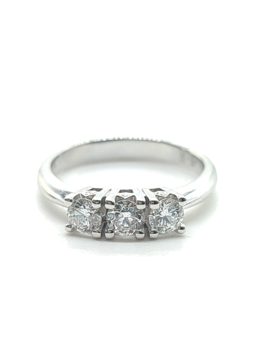 Gold trilogy ring with 0.63ct diamonds