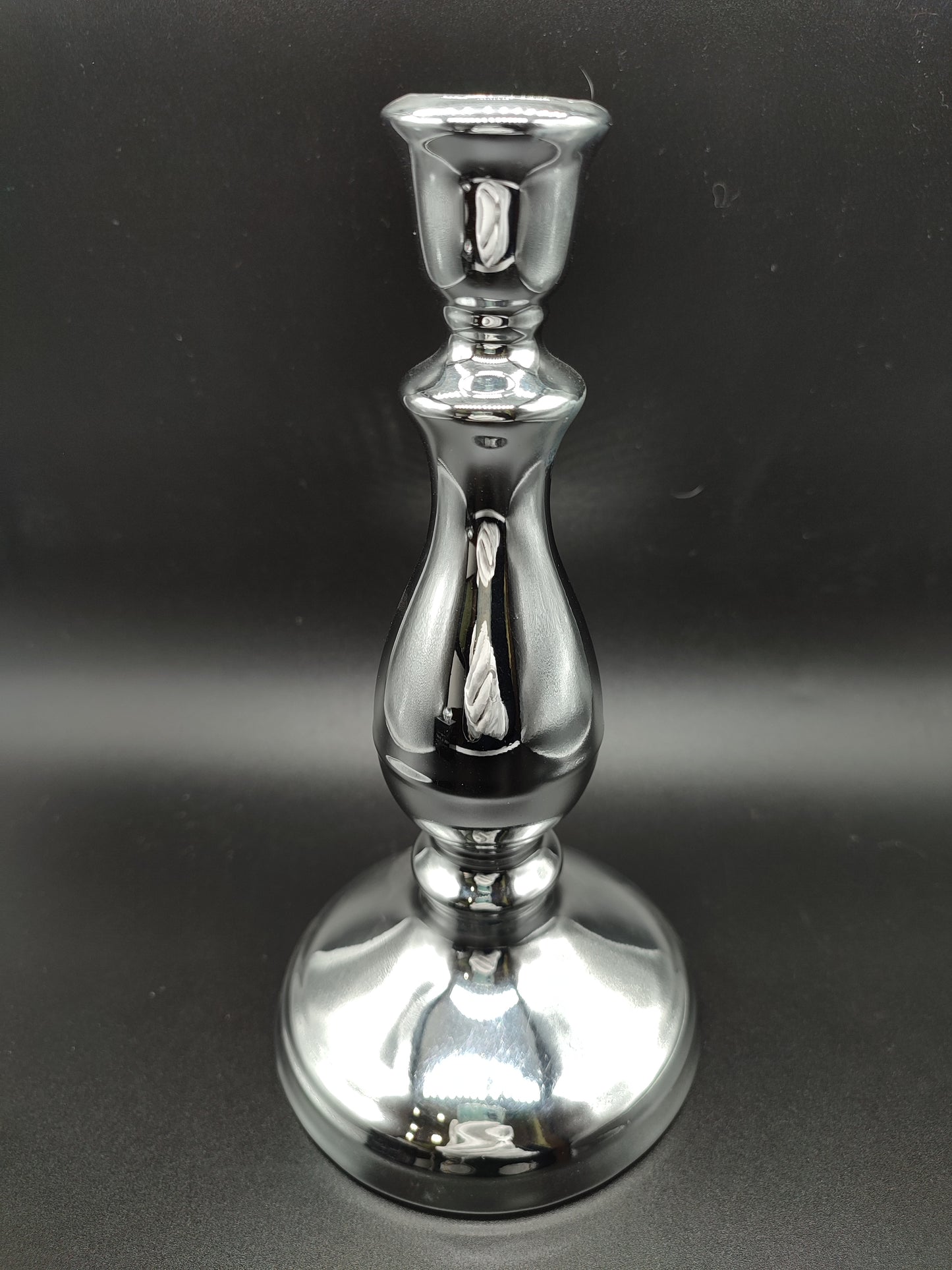 Single silver candelabra H.22cm