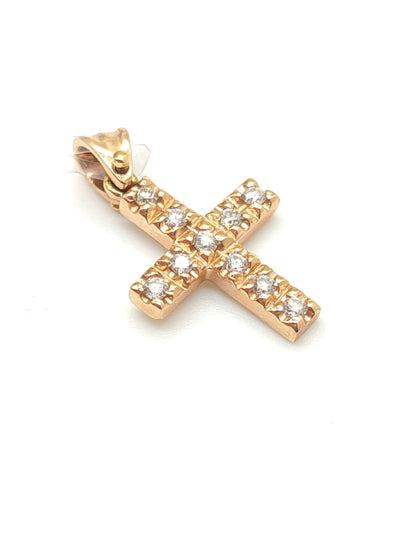 Gold cross pendant with diamonds