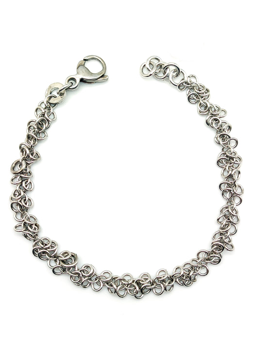 Silver bracelet with intertwined rings