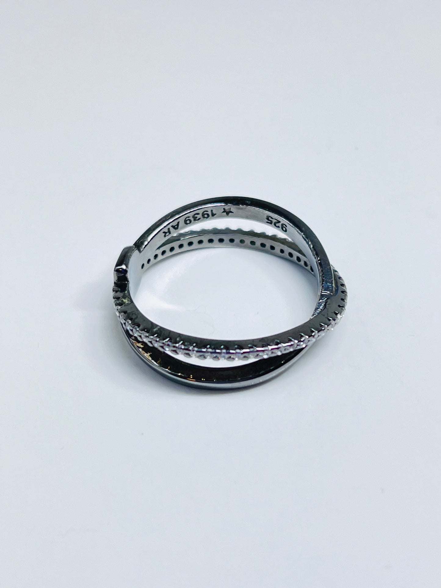 Burnished silver ring with double zirconia band