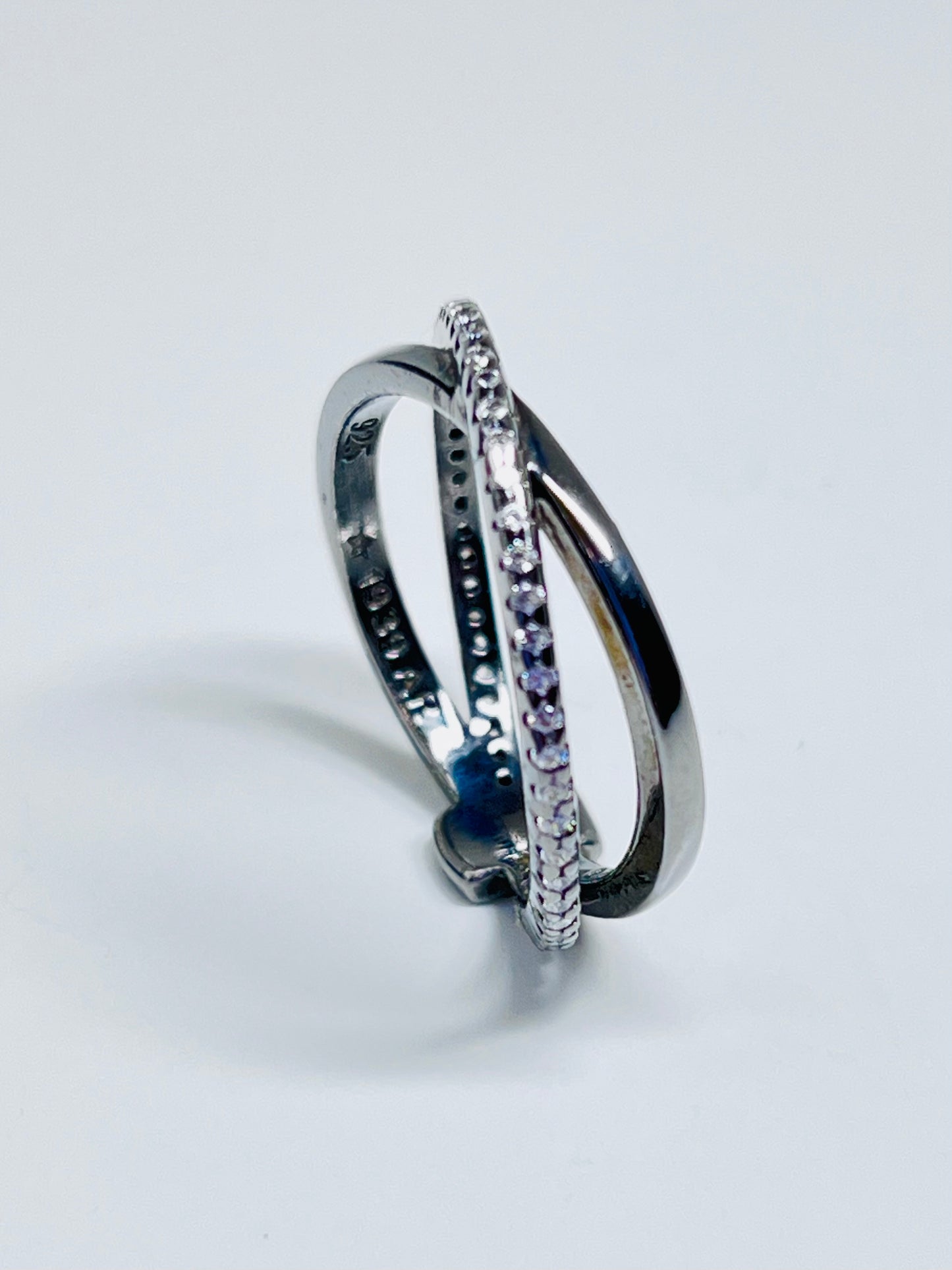 Burnished silver ring with double zirconia band
