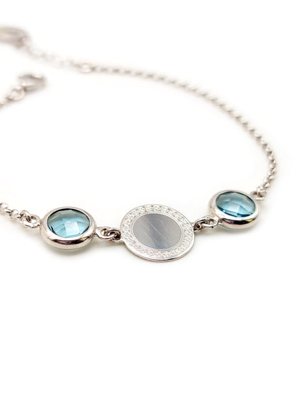Silver bracelet with blue quartz and zircons